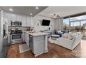 Cozy open living space, hardwood floors, island kitchen with stainless steel appliances at 315 Arlington Ave # 705, Charlotte, NC 28203