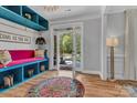 Bright foyer with colorful rug and seating, plus statement decor at 835 Ryans Pl, Fort Mill, SC 29715