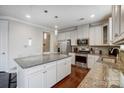 Well-equipped kitchen featuring granite countertops, stainless steel appliances, and ample cabinet space at 10161 Castlebrooke Dr, Concord, NC 28027