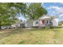 Neighborhood view featuring charming homes and lush trees on a sunny day at 206 Friedheim Rd, Rock Hill, SC 29730