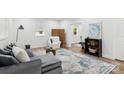 Bright living room featuring comfortable seating and a decorative rug at 221 N Davis Ave, Newton, NC 28658