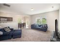 Open floor plan featuring living room and dining room combination with lots of natural light at 244 Aershire Ct, Concord, NC 28025