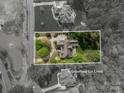Aerial lot map of home's outdoor firepit and pristine landscaping at 3160 Ashwood Park Dr, Belmont, NC 28012