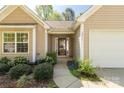 Inviting front entrance with manicured landscaping and a well-lit pathway at 3411 Xandra Ct, Indian Land, SC 29707