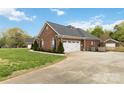 House with a three car garage and long driveway at 15118 Marshall Valley Ct, Mint Hill, NC 28227