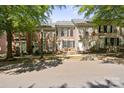 Charming brick townhomes featuring well-maintained landscaping and classic architectural details at 164 Singleton Rd, Mooresville, NC 28117