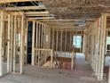 Interior view of new construction home featuring a staircase and open floor plan with wooden framing at 2212 Indigo Branch Rd, Indian Land, SC 29707