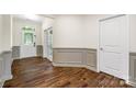 Elegant foyer with hardwood floors, classic wainscoting, and a bright, welcoming entrance at 4006 Fall Oak Ter, Fort Mill, SC 29707