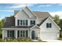 Charming two-story home with a covered porch, blue shutters, and a well-manicured lawn at 6707 Baker Creek Ave, Indian Land, SC 29707