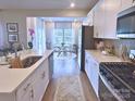 Well-appointed kitchen flows into breakfast nook and offers ample counter space at 314 Olympia Way, York, SC 29745