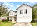 Charming two-story home with white siding, black shutters, and a well-maintained front yard at 3254 Pikes Peak Dr, Gastonia, NC 28052