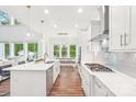 Bright and airy kitchen with quartz countertops, stainless steel appliances, and an open layout at 6006 Waxhaw Crossing Dr, Waxhaw, NC 28173