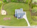 An aerial view of the property features a meticulously maintained yard and driveway at 1079 Sage Pine Cir, Clover, SC 29710