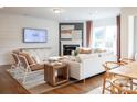 Cozy living room with fireplace, modern furniture, hardwood floors, and bright natural light at 124 Fordham Ct # 19, Fort Mill, SC 29715