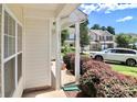 Cozy porch view showcasing the well-kept landscaping and neighboring homes at 168 Limerick Rd # C, Mooresville, NC 28115