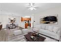 A bright living room and dining area with a ceiling fan and modern decor at 19725 Deer Valley Dr, Cornelius, NC 28031