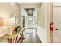 Elegant entryway with hardwood floors, stylish console table, and a decorative mirror at 2009 Autumn Dr # 2, Monroe, NC 28110
