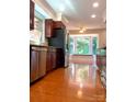 Modern kitchen featuring stainless steel appliances, and a view of the backyard at 211 Worthington St, Shelby, NC 28150