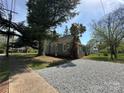 Exterior view featuring a gravel driveway and the side of the house at 501 E Lafayette St, Salisbury, NC 28144