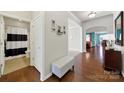Inviting foyer with hardwood floors, soft gray walls, and a bench at 5039 Folly Ln, Fort Mill, SC 29707