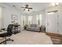 Bright living room offers comfortable seating and lots of natural light at 791 Seigle Point Dr, Charlotte, NC 28204