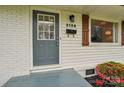 Close-up of a home's front door and exterior, showcasing the updated details and architectural style at 2138 Syracuse Dr, Charlotte, NC 28216