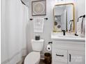 Freshly renovated bathroom featuring sleek fixtures, a neutral color palette, and modern design at 7324 Swans Run Rd, Charlotte, NC 28226
