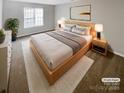 Serene main bedroom with natural light, neutral tones, and comfortable furnishings, creating a relaxing retreat at 9527 Scotland Hall Ct, Charlotte, NC 28277