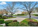A well-maintained street view shows a neatly landscaped yard and neighborhood charm at 125 Snead Rd # 60, Fort Mill, SC 29715