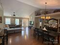 Inviting living room featuring hardwood floors, neutral tones, and lots of natural light at 154 Tiger Oak Ln, Rockwell, NC 28138