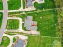 An aerial view shows the property lines encompassing the home's large landscaped yard and surrounding trees at 1902 Windmere Dr, Monroe, NC 28110