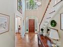 Elegant foyer features a hardwood floor, staircase and natural light at 2313 Beechwood Dr, Waxhaw, NC 28173