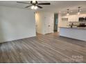 Open-concept living space with new vinyl floors and abundant natural light at 833 Arlington Ave, Rock Hill, SC 29730