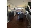 Updated kitchen featuring stainless steel appliances and stylish granite countertops at 110 Buffalo Nw Ave, Concord, NC 28025