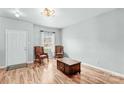 Bright living room with hardwood floors, stylish chairs, and natural light at 120 Vermillion Loop, Statesville, NC 28625