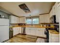 Classic kitchen features white cabinets, laminate countertops and modern appliances at 2006 Kollege Ln, Crouse, NC 28033