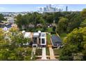 Stunning aerial view of the modern home with skyline view at 215 Keswick Ave, Charlotte, NC 28206