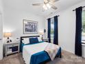 Cozy bedroom features a comfortable bed, neutral decor, and soft lighting, creating a relaxing atmosphere at 9710 Ainslie Downs St, Charlotte, NC 28273