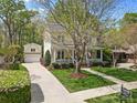 Charming two-story home with a detached garage and well-maintained landscaping at 2569 Lower Assembly Dr, Fort Mill, SC 29708