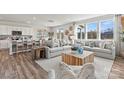 Bright living room boasts modern furnishings, large windows, and an open floor plan at 259 Bezelle Ave, York, SC 29745