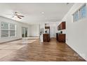 Spacious living area with wood floors and sliding doors to backyard at 322 Flat Rock Dr, Denver, NC 28037