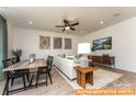 Open-concept living and dining area, featuring modern decor, neutral colors, and plenty of natural light at 6215 Honor Ave, Midland, NC 28107