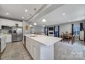 Modern open-concept kitchen with a large island, stainless steel appliances, and plenty of cabinet space at 1018 Hinson Forest Rd, Monroe, NC 28110