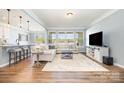 Spacious living room with lots of natural light and open floor plan perfect for Gathering and entertaining at 108 Toxaway St, Mooresville, NC 28115