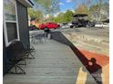 Spacious wood deck with outdoor seating area, perfect for entertaining at 113 Hideaway Trl, Mount Gilead, NC 27306