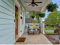 Inviting covered front porch featuring comfortable seating and views of the neighborhood at 1801 Wilmore Dr, Charlotte, NC 28203