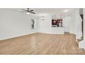 Bright living room with hardwood floors and lots of natural light at 1828 Aston Mill Pl, Charlotte, NC 28273