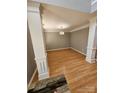 Bright living room with hardwood floors, white trim and an elegant chandelier at 5025 Wicklow Dr, Gastonia, NC 28054