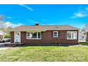 Quaint one-story brick home featuring neat landscaping and classic architectural details at 534 Georgia Ave, Statesville, NC 28677