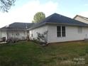 View of a backyard with a gazebo and a privacy fence at 158 Margaret Turner Rd, Charlotte, NC 28216